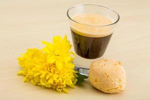 Espresso on wooden background photo