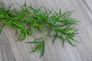 Tarragon on wood photo