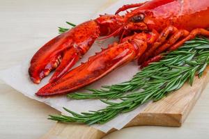 Boiled lobster on wood photo