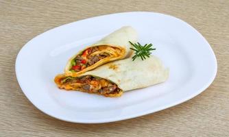 Wrap tortilla on plate photo