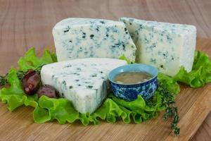 Blue cheese on wood photo