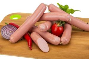 Sausages on wood photo