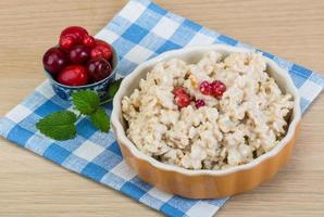 Oatmeal on wood photo