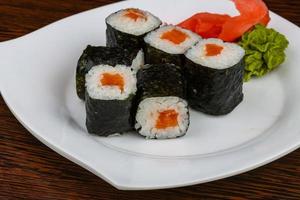 Salmon maki on wood photo