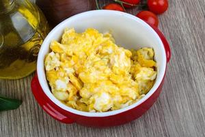 Scrambled eggs on wood photo