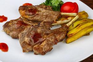 Lamb chops on plate photo