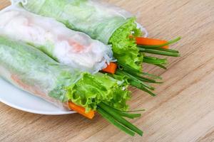 Spring rolls on wood photo