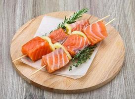 Salmon skewer dish view photo