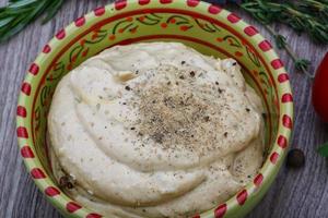 Hummus in bowl photo