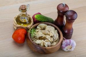 Russian dumplings on wood photo