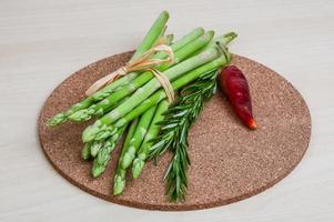 Raw asparagus dish photo