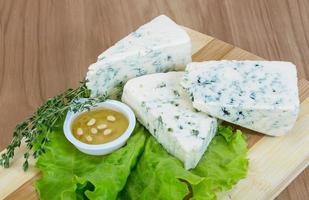 Blue cheese on wood photo