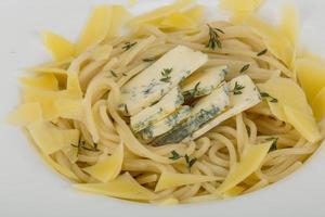 Cheese pasta on plate photo