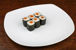 Salmon maki on wood photo