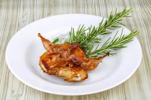 Grilled quail dish photo