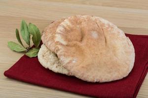 Pita on wood photo