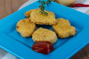 Nuggets on plate photo