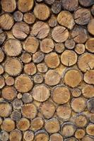 Decorative fence of wooden blocks photo