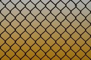 Texture of an old and rusty metal mesh on a neutral colored background photo