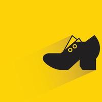 high heels with shadow on yellow background vector