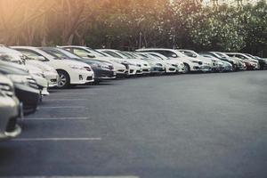 Cars parked in the parking lot.Open space area Outdoors. photo