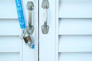 date door was locked with padlocks and chains photo