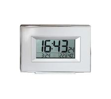 Silver color digital clock made from plastic material photo