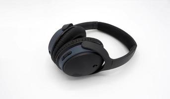 Black wireless headphone around ears. photo