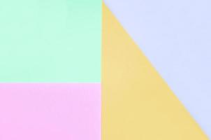 Texture background of fashion pastel colors. Pink, violet, orange and blue geometric pattern papers. photo