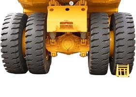 Mining, mining dump truck of yellow color on a white isolated background. Back view. photo