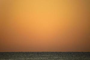 Sunrise over the Red Sea, A palette of shades of brown, red colors. Background. photo