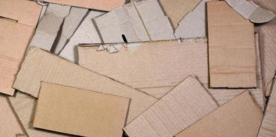 Background of paper textures piled ready to recycle. A pack of old office cardboard for recycling of waste paper. Pile of wastepaper photo