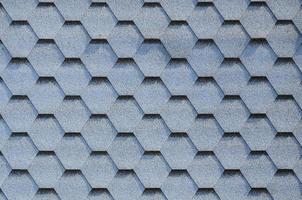 Modern roofing and decoration of chimneys. Flexible bitumen or slate shingles photo