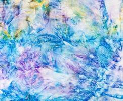 abstract blue colored stitched silk batik photo
