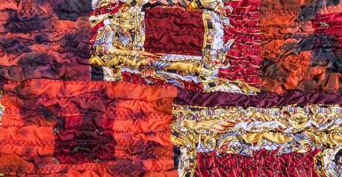 ornament of red brown patchwork scarf photo