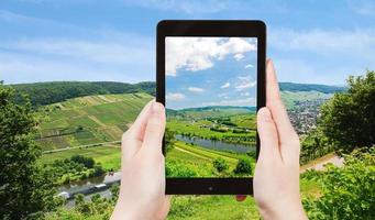 tourist taking photo of Moselle valley, Germany