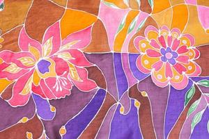 hand painted floral ornament on silk batik scarf photo