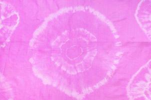 fragment of abstract pattern of pink scarf photo
