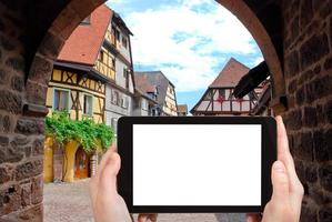 tourist photographs Riquewihr town, France photo