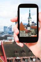 tourist photographs cathedrals in Tallinn city photo