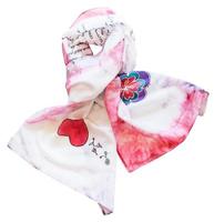 knotted silk scarf with red heart isolated photo