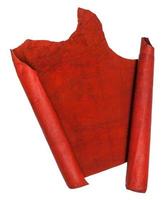 unrolled scroll from red suede isolated photo