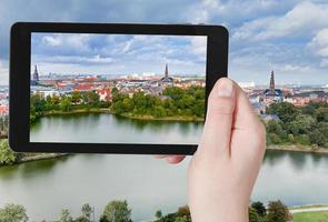 tourist taking photo of Copenhagen center