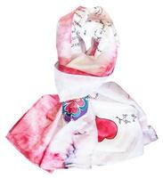 tied silk scarf with red heart isolated photo