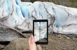 taking photo of spring in briksdal glacier Norway