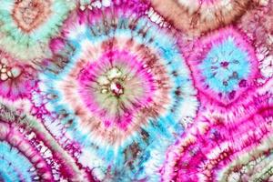 part of abstract bright ornament in tie-dye batik photo