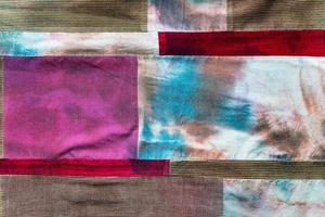 hand-stitched patchwork cloth from velvet fabric photo