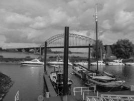 The city of Nijmegen at the river waal in the netherlands photo