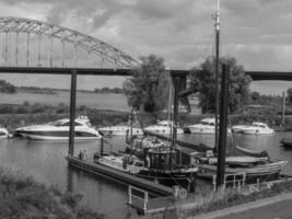 The city of Nijmegen at the river waal in the netherlands photo