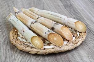 Sugar sticks on wood photo